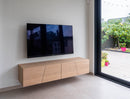 BORDEAUX - Hangend tv-meubel op maat - Massief Eikenhout - Schuine deuren